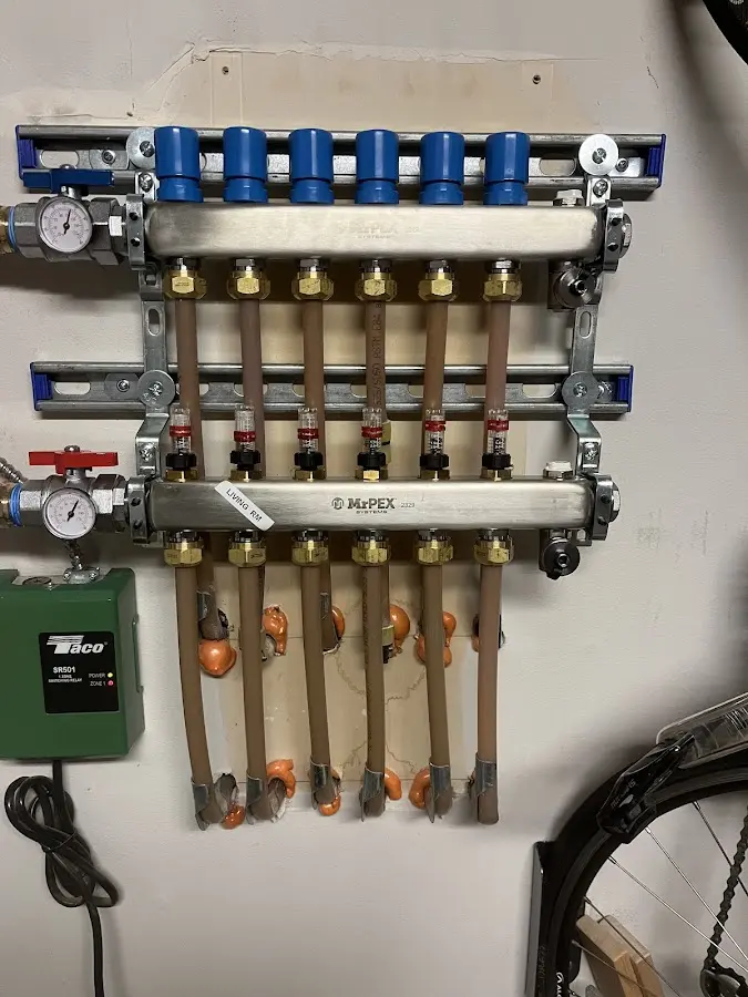 Plumber performing Leak Detection at a residential property in Holliston